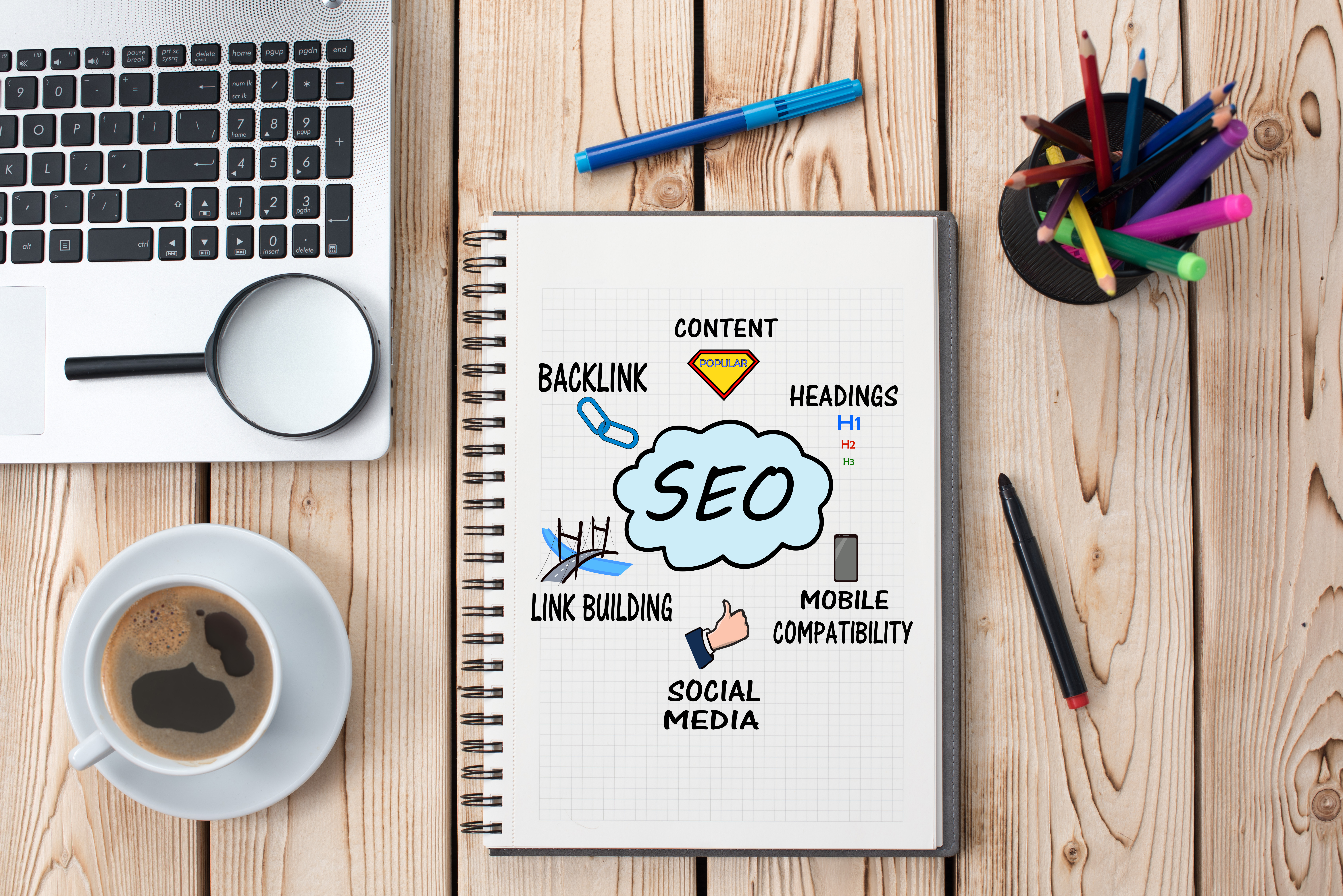 Notebook with social media brainstrom for search engine optimisation